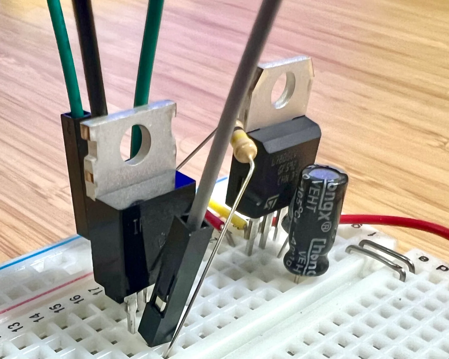 An IRFZ44N and an LM7805, each with supporting components.
