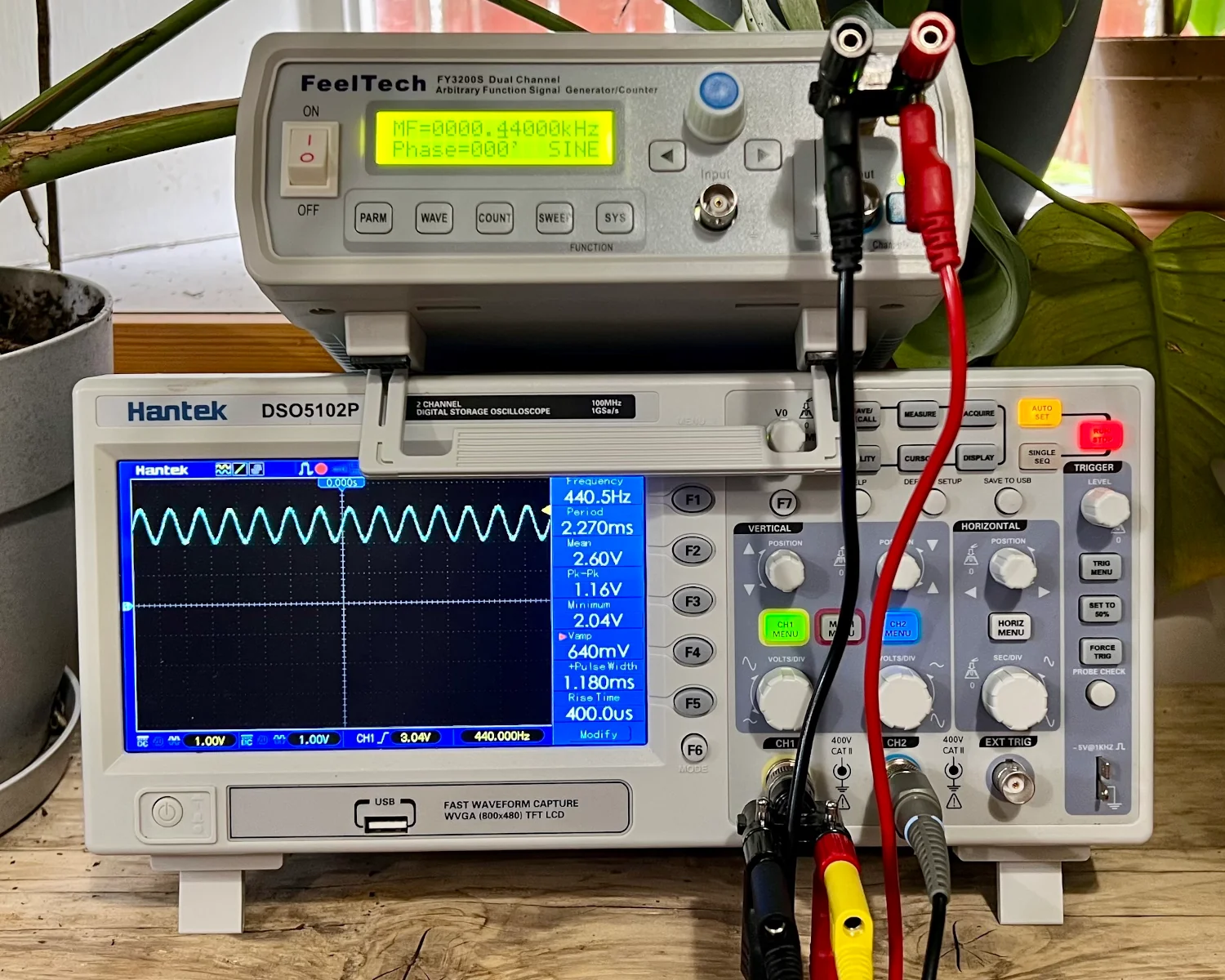 A signal generator and oscilloscope.