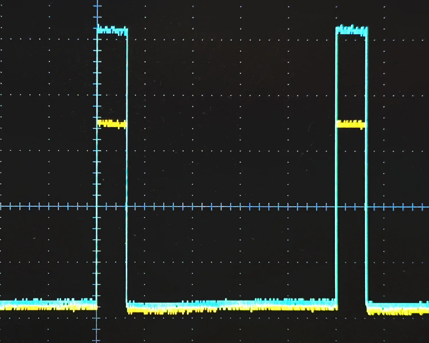 An oscilloscope display showing two PWM signals, one in the range of 0-3.3v and another in the range of 0-5v.