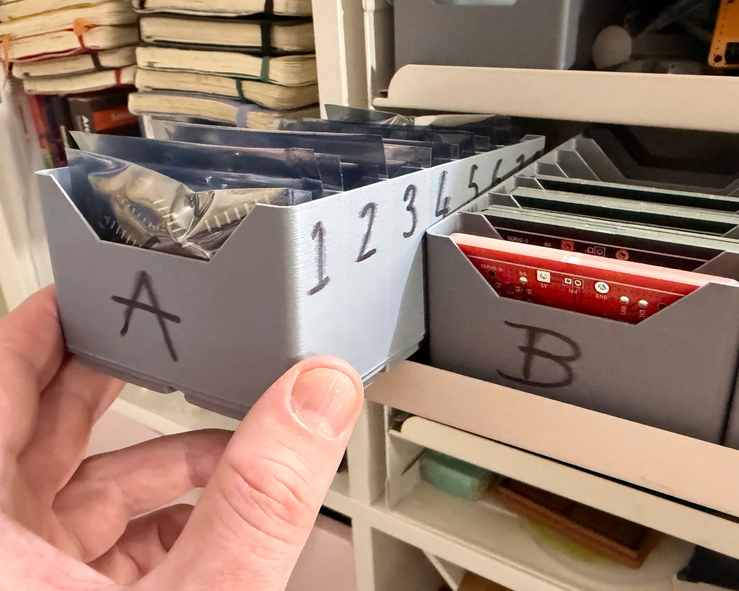 Picking stock from my labelled Gridfinity bins.
