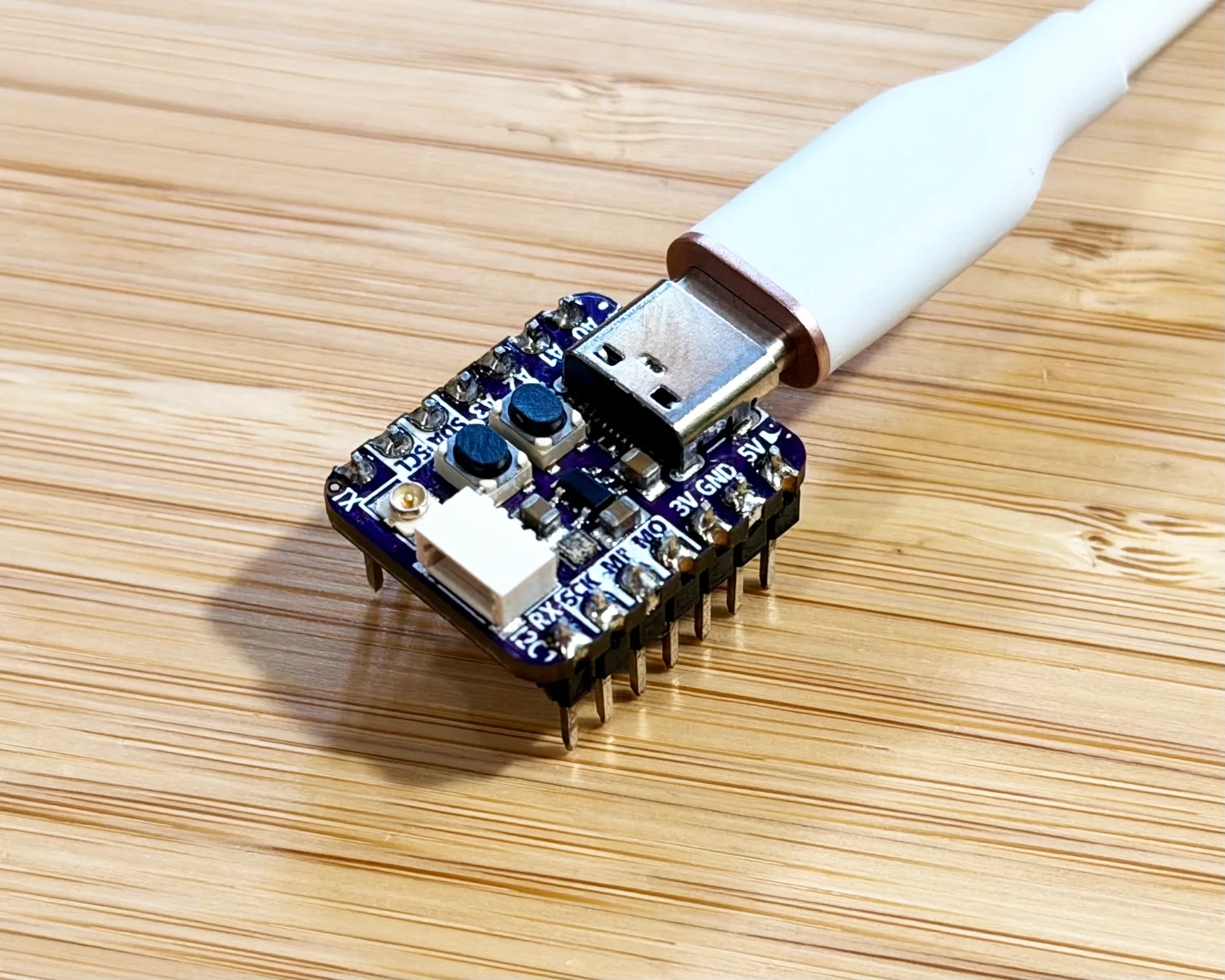 An Adafruit ESP32-S2 Qt Py