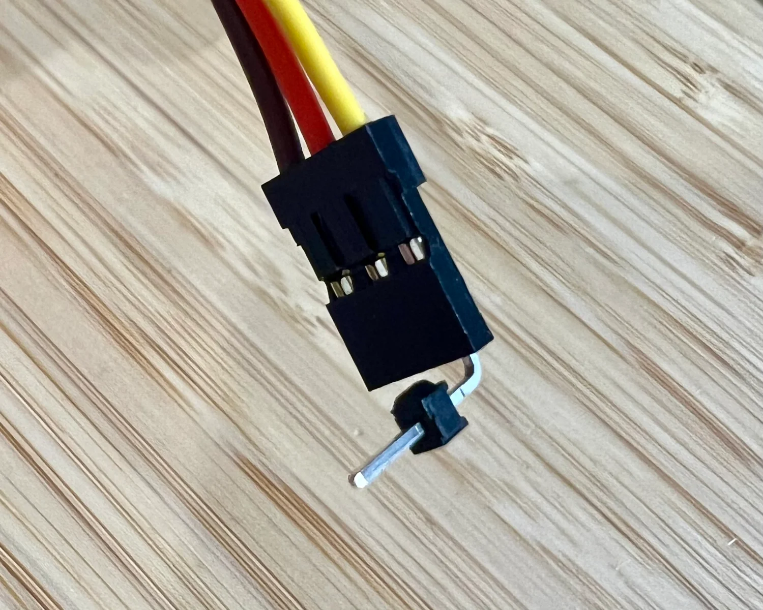 A right-angled header in a servo motor connector.