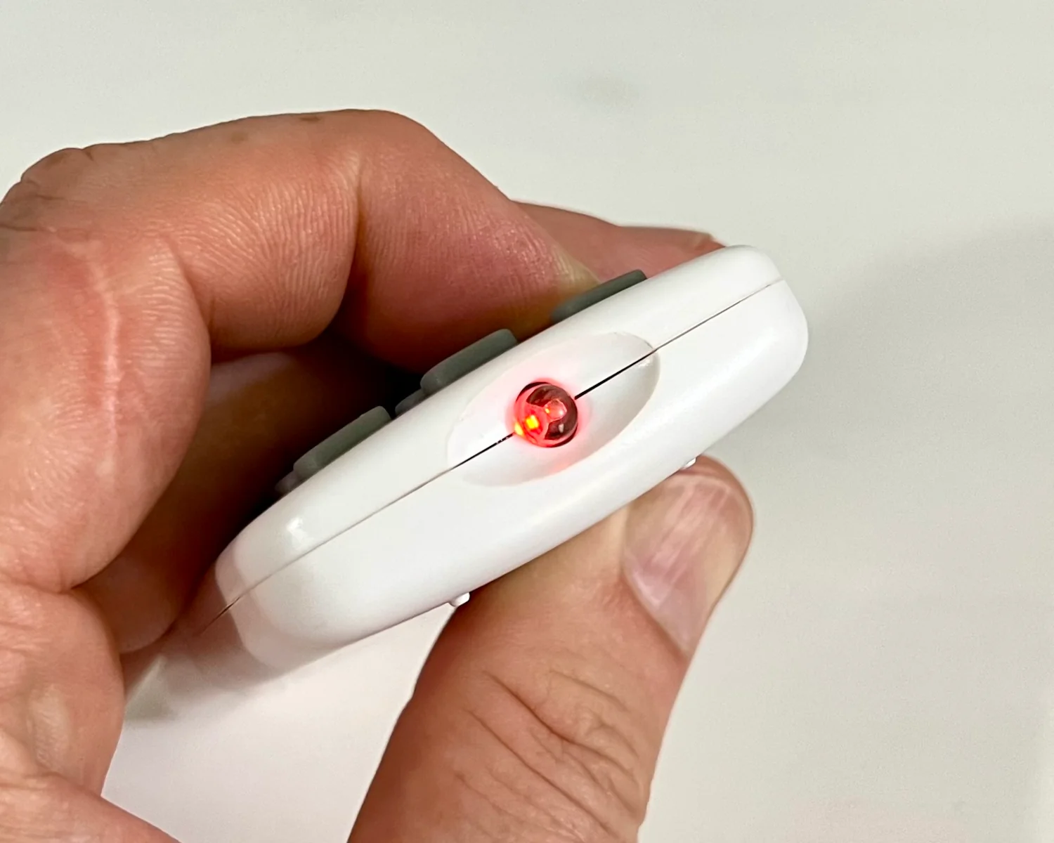 The night light's remote control; the red LED obviously visible.