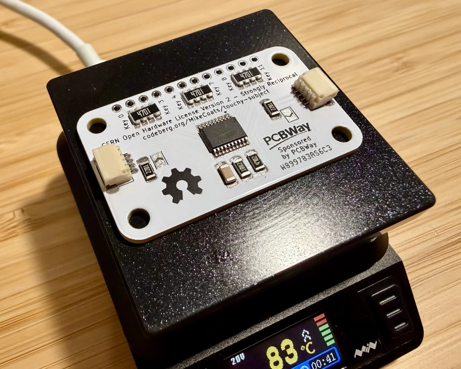 A Touchy Subject board on a soldering hot-plate.