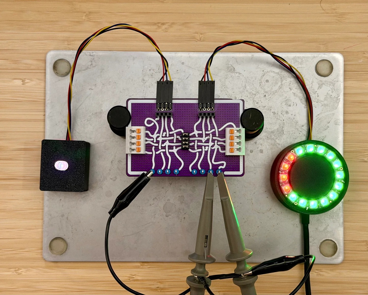 A Spy! Break! Inject! connected to a controller, some oscilloscope probes, and display showing 16 green LEDs.