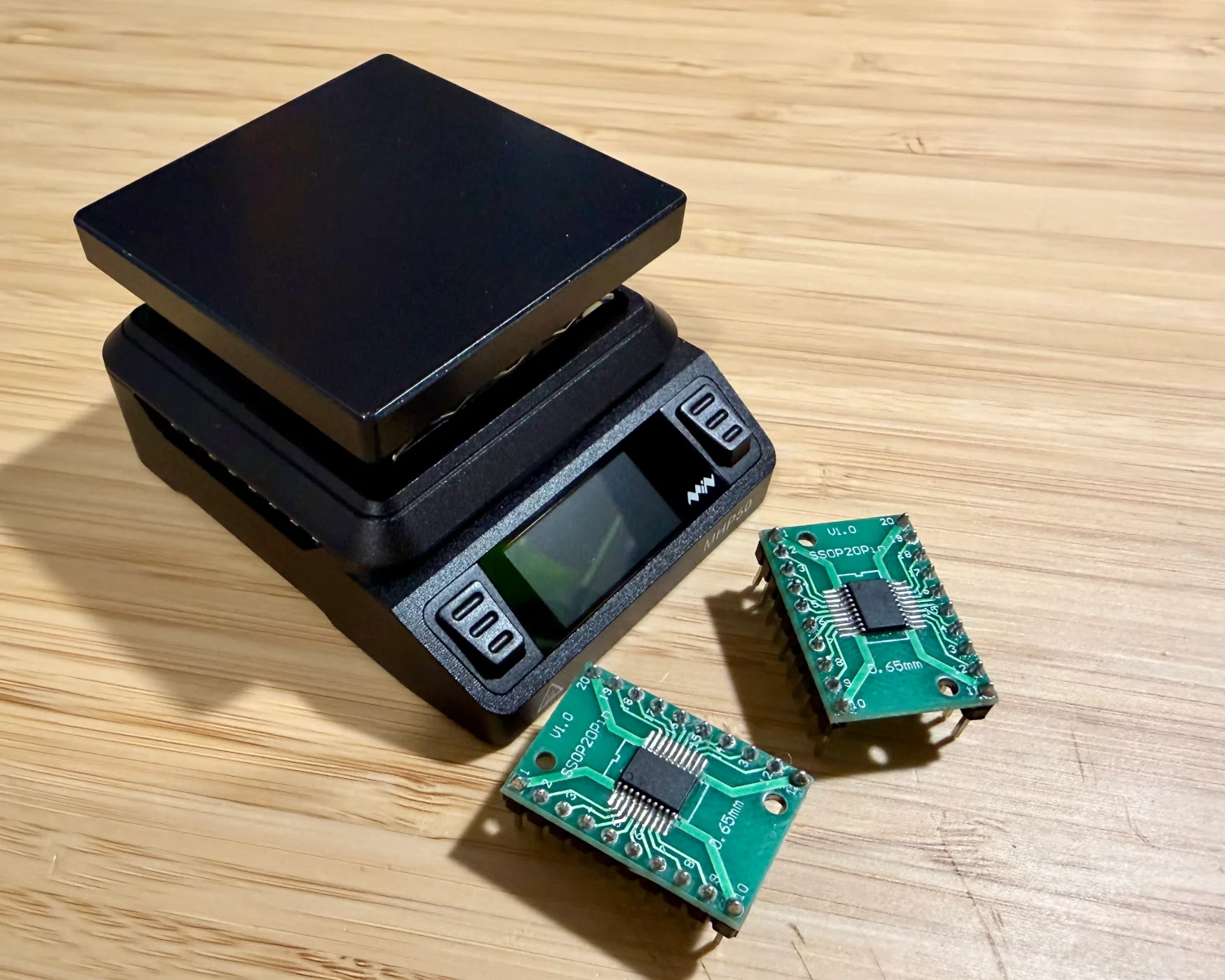 An MHP50 hot plate and two SMD soldered chips.