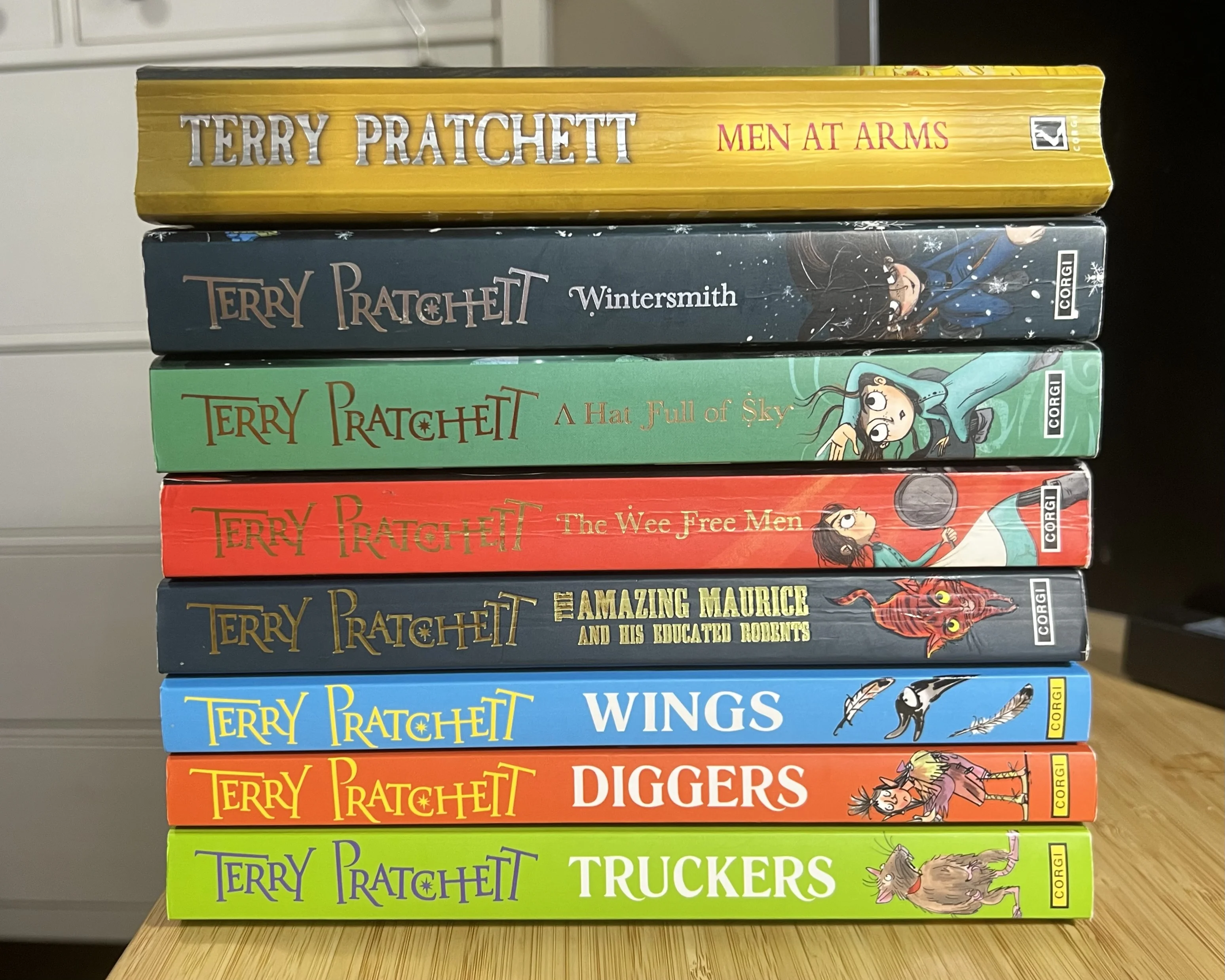 A stack of books by Terry Pratchett.